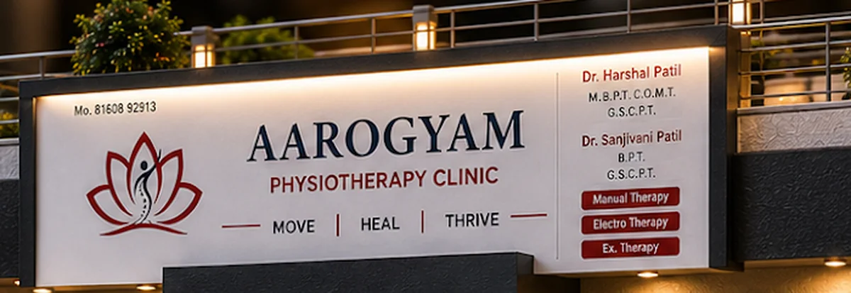 Clinic signboard with name, tagline, doctor qualifications
